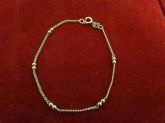P49 - Pulseira com detalhes de Bolinhas duplas